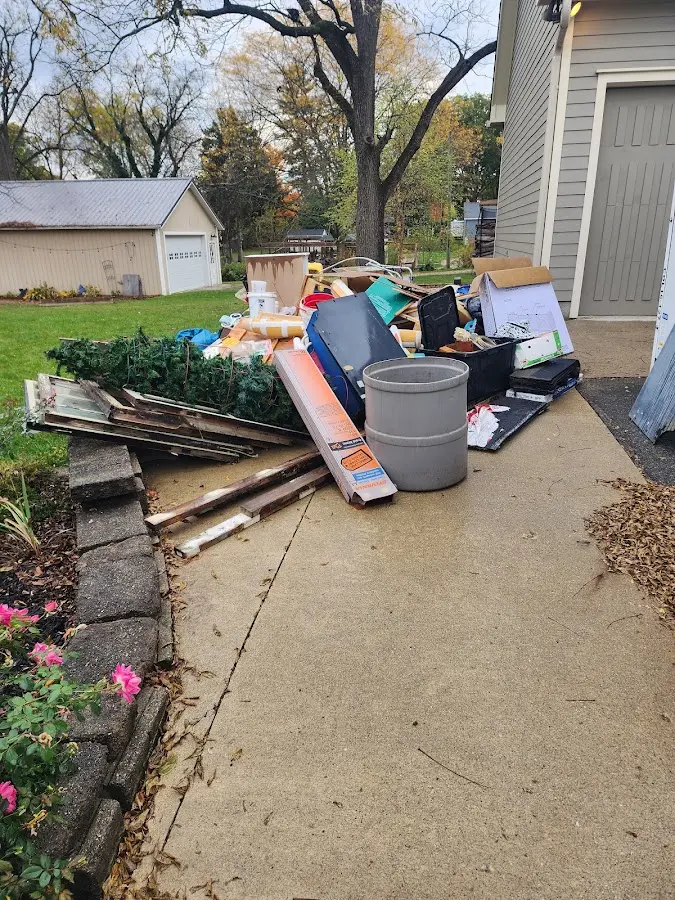 Dumpster being loaded with debris for Residential Dumpster Rental in Nappanee